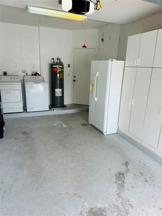 Extra refrigerator in garage