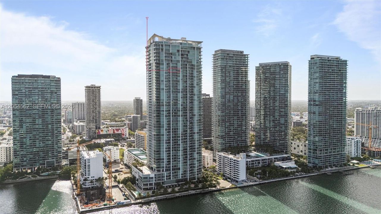 Aerial perspective of the Biscayne Beach towers along Biscayne Bay
