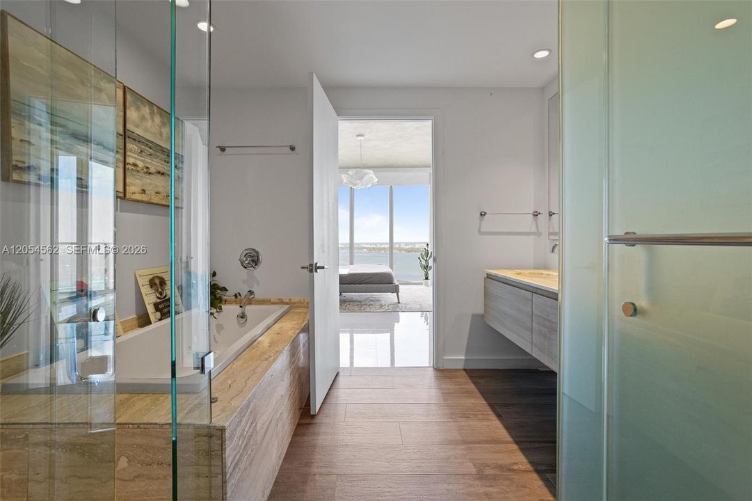 Modern guest bathroom with glass enclosure and contemporary finishes