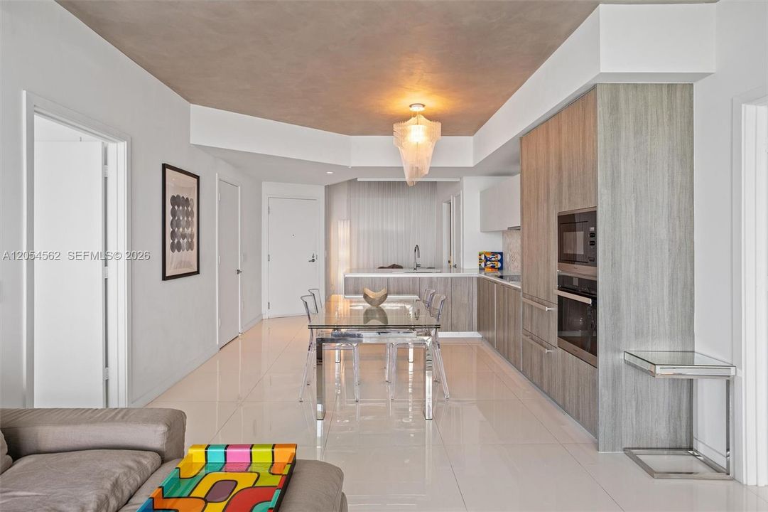 Open-concept living and dining space finished for effortless entertaining