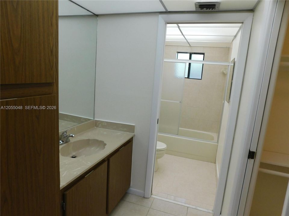VANITY AREA LEADING TO MASTER BATH