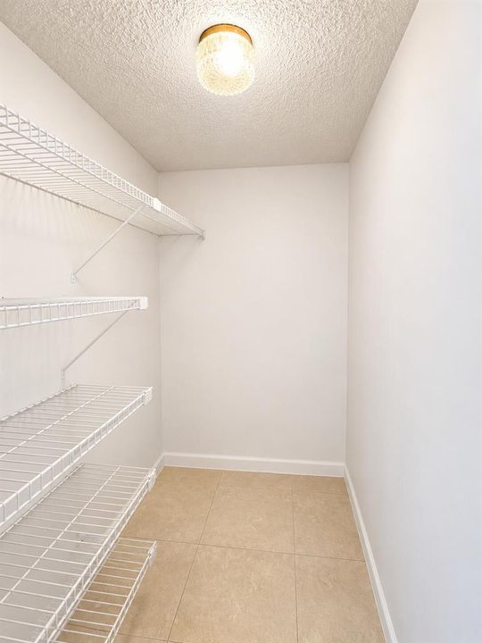 Utility Closet By Entry Hallway