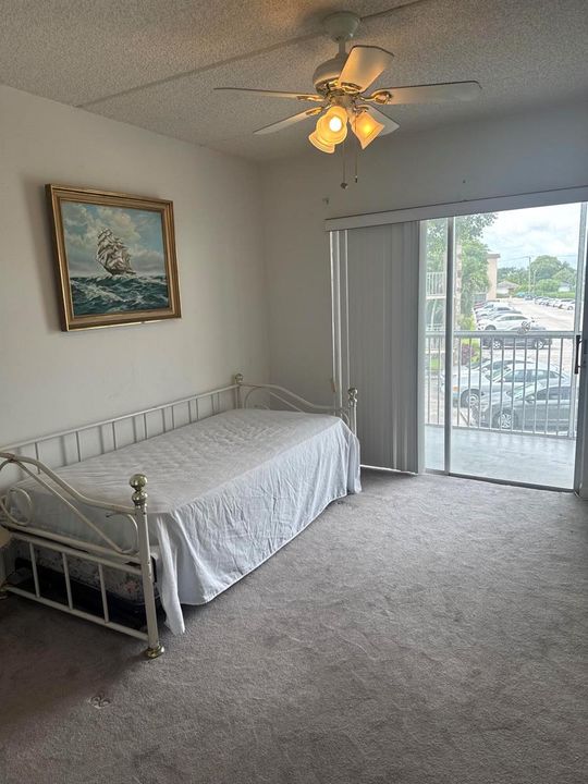 Bedroom with slider to deck