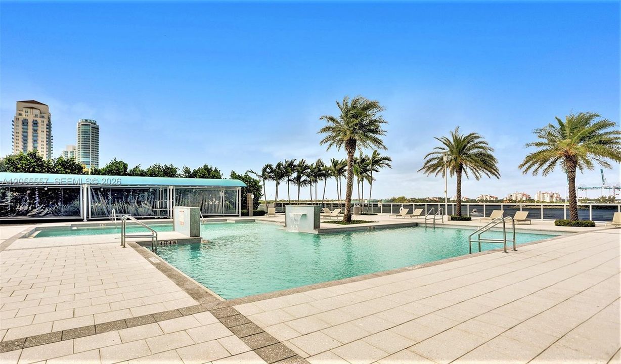 Scenic Spacious Pool Deck with on-site restaurant overlooking Biscayne Bay.