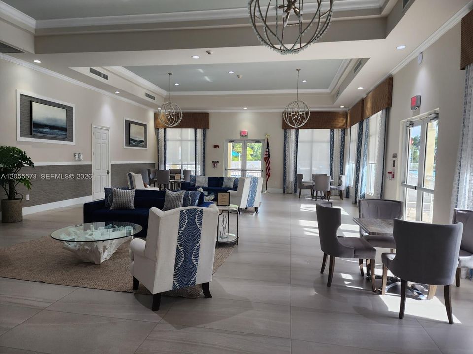 Welcome to the elegant community clubhouse. A sophisticated and welcoming space available for resident events for a nominal fee, designed to greet your guests with distinction.