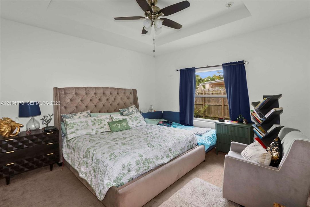 Retreat to your spacious primary suite! This serene sanctuary offers a peaceful atmosphere with generous proportions, providing the ultimate comfort and a perfect escape at the end of the day.
