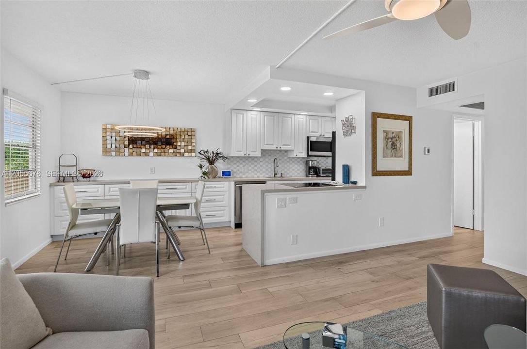 Living room, dining area and kitchen.