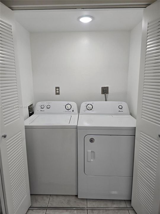 First-floor laundry area conveniently located next to the kitchen.