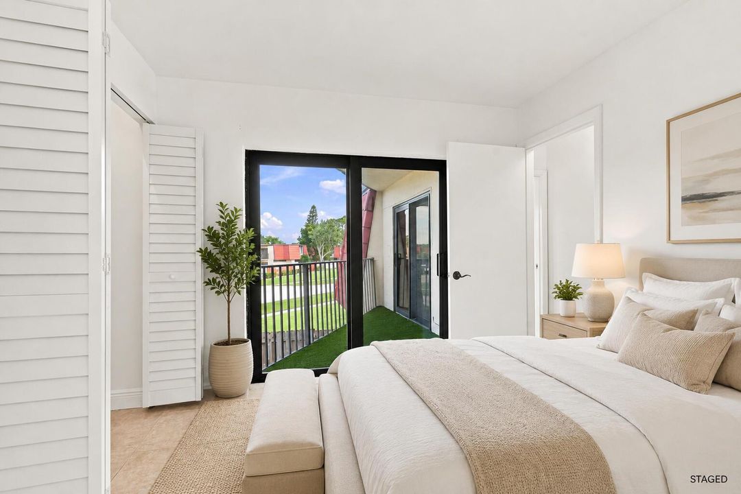 victoria_bedroom_balcony_staged_1536x102