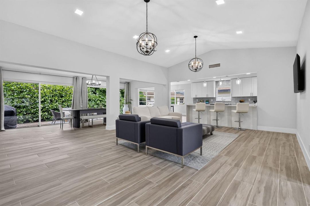 LIVING ROOM WITH CATHEDRAL CEILINGS