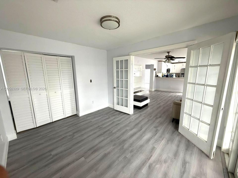 GROUND LEVEL ROOM WITH HALF BATH MAYBE USED AS FOURTH BEDROOM OR OFFICE