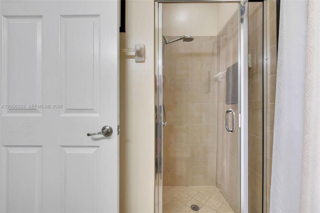 First Floor Full Bathroom with access to the backyard.