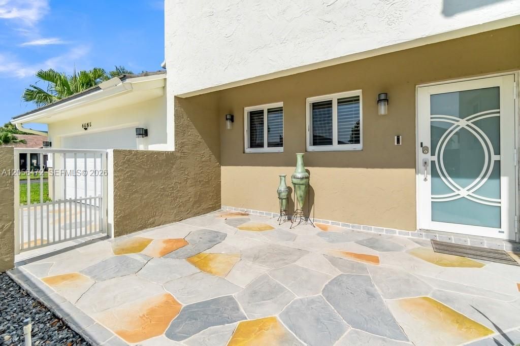 Zero lot line with neighboring home but still with plenty of yard space.