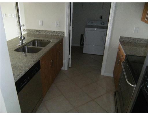 6529 Emerald Dunes Drive 302 kitchen3