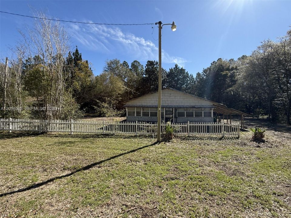 Selling land. Do not enter house.