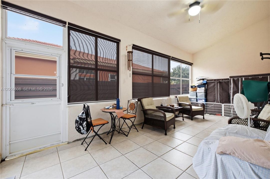 Florida Room enclosed additional 20'.3" X 10'.5"sq. ft. under roof