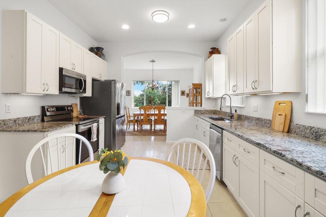Modern kitchen with white cabinets