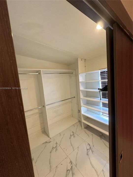 Walk-In Closet (Master Bedroom)