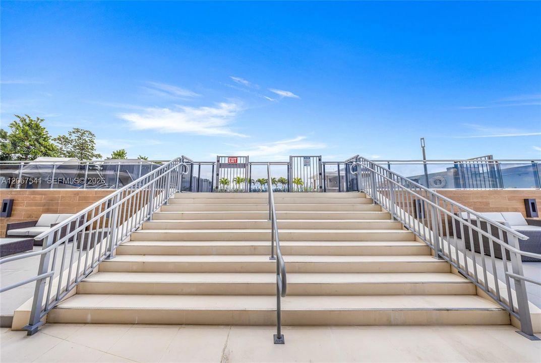 Stairs leading to the pool area