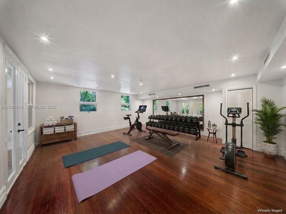 extra room on the main level that could be an office, gym, or play room