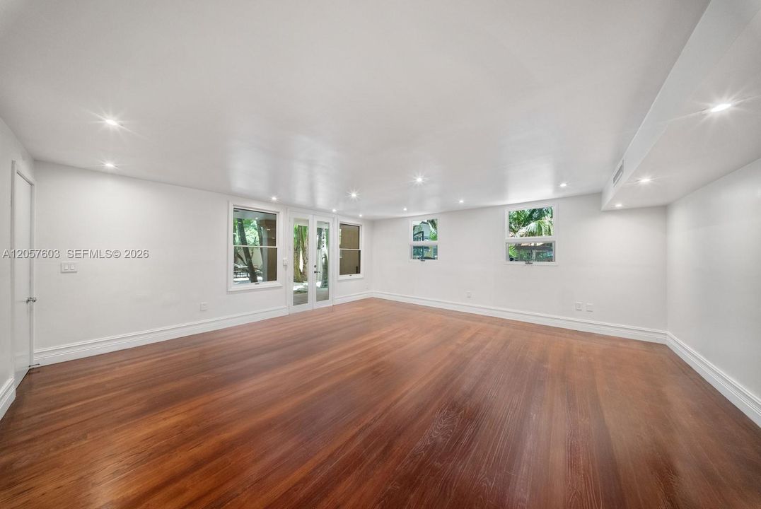 extra room on the main level that could be an office, gym, or play room