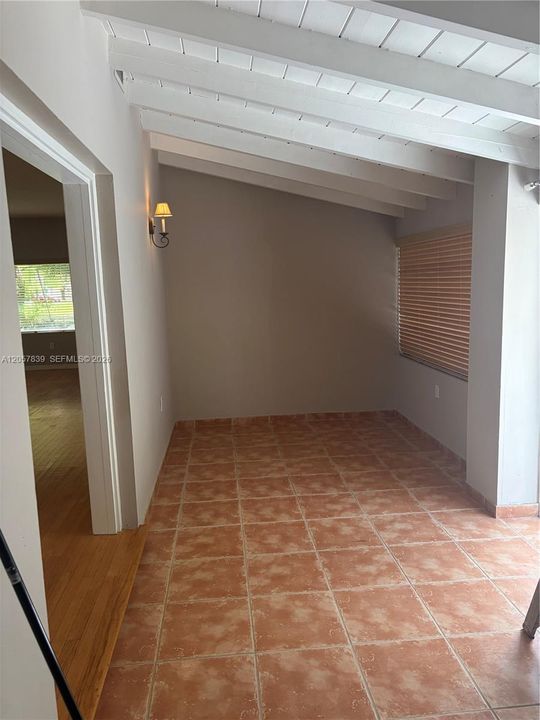 Sunroom area, living space off living room- to patio