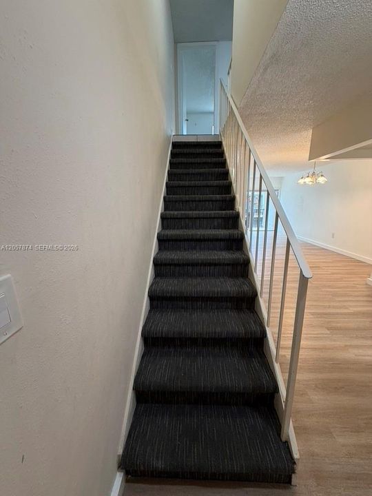 Stairs to Master bedroom and bath