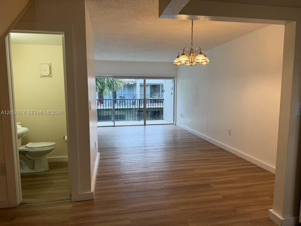 Dining/Living room with convenient half bath