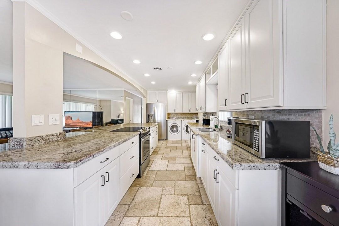 Kitchen has recessed lights