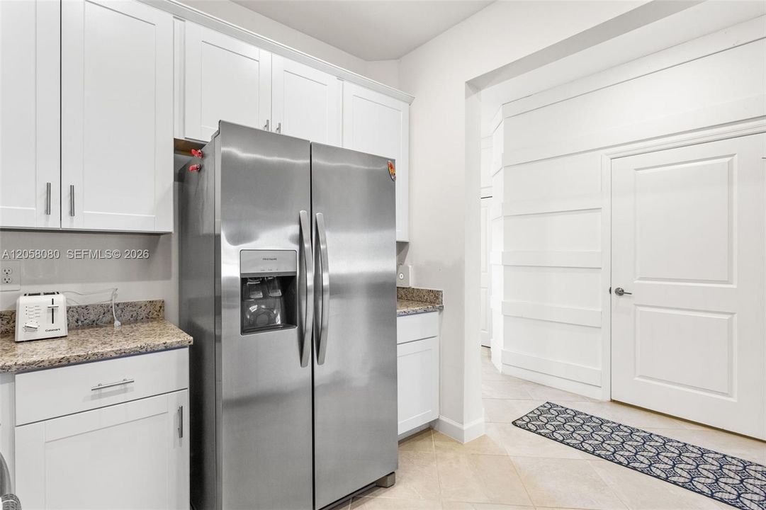 Abundant cabinet and counter space provides plenty of storage and functionality for everyday living and entertaining