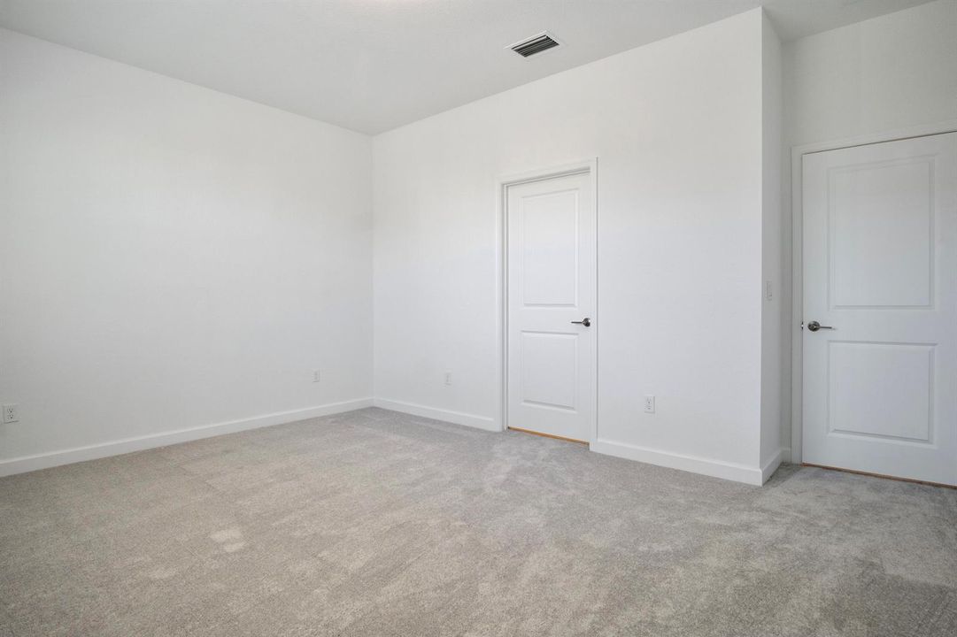 Primary bedroom to bathroom.jpg-FULL
