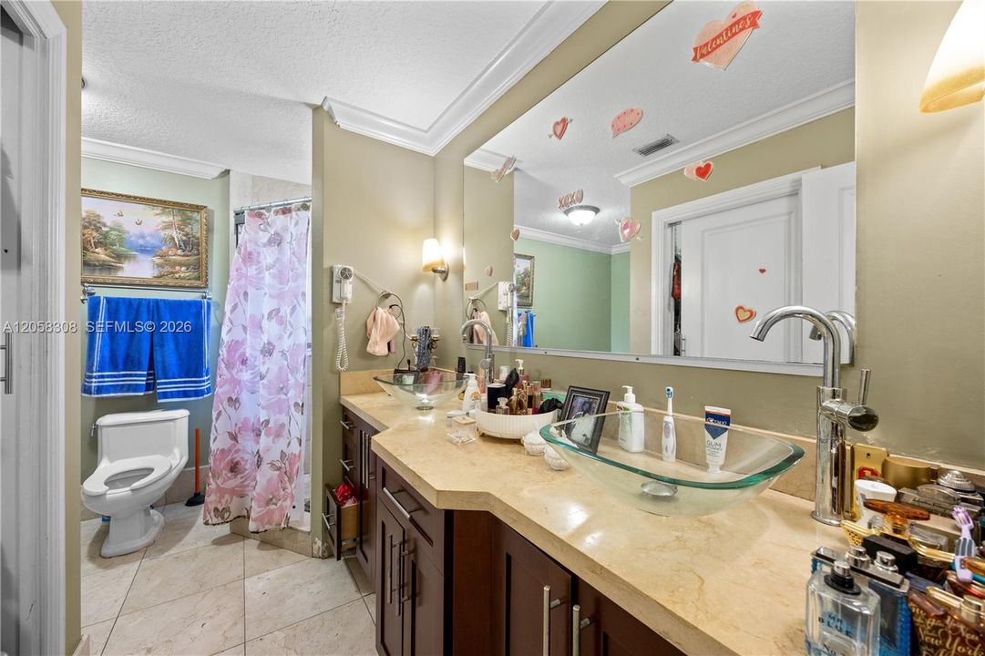 Master bathroom with dual sinks.