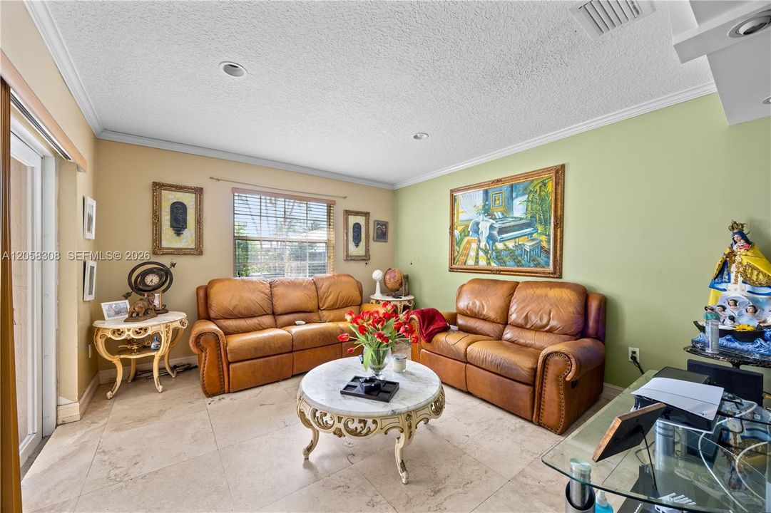 Family room exists to the pool area.