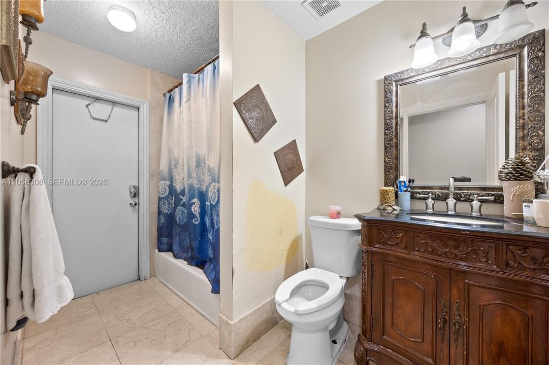 Second bathroom with tub. Can be used as cabana bathroom also.