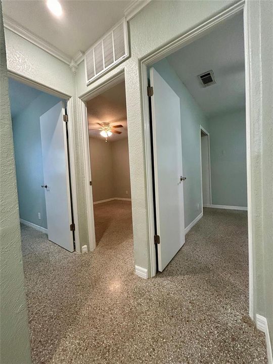 entry to 1st and 2nd guest bedrooms