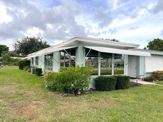 Front and side view of corner villa