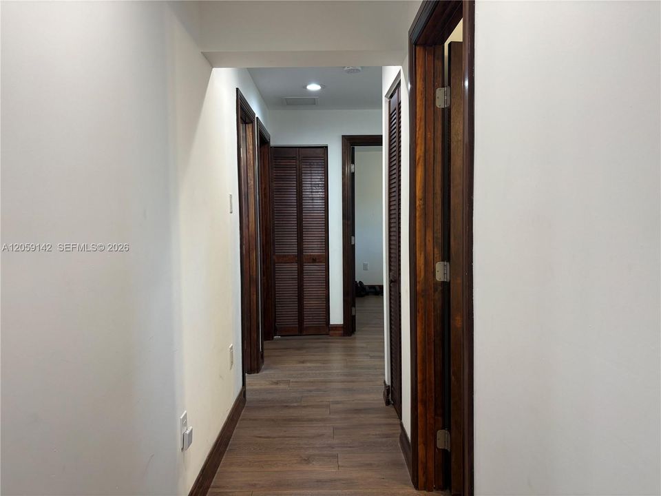 Hallway leading to Bedrooms 3-5 and Bathroom 3