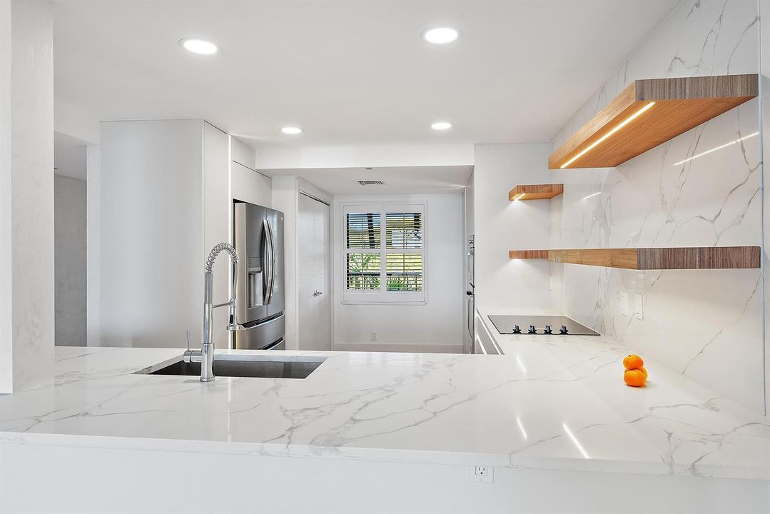 Kitchen View/Open Shutters