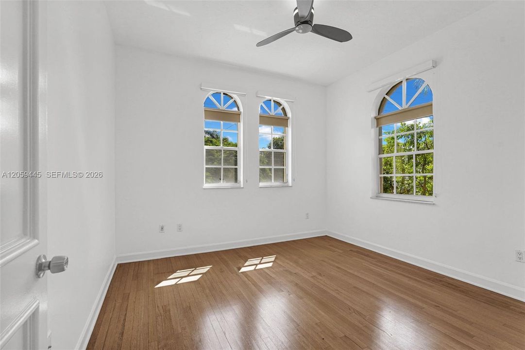 Bedroom #2 ( second floor ) | Arched windows  and closet