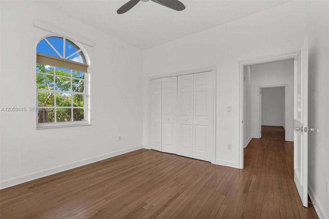 Bedroom #2 ( second floor ) | Arched windows  closet