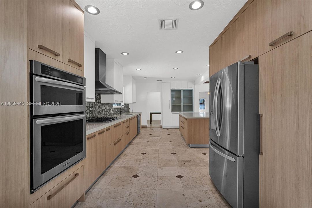 Chefs Dream Custom Kitchen | SS Appliances, Gas Cooktop, Breakfast Nook, Wine Cooler