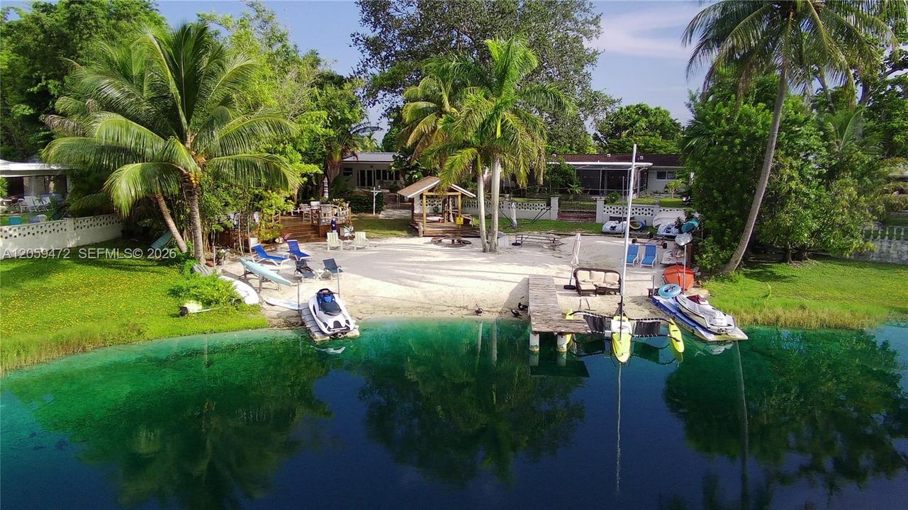 Swimmable, crystal-clear waters right in your own backyard — a rare and coveted lakefront lifestyle. Professionally treated monthly for pests and weeds.