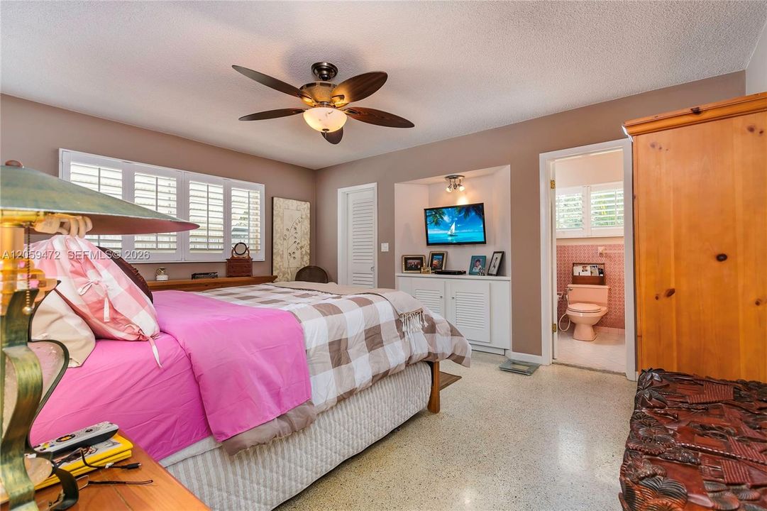 Bright, spacious master bedroom with recently updated finishes, ceiling fan, and ample natural light and recently updated bathroom. FYI - Some paint colors have changed since the last pictures.  Furniture, some lighting fixtures  & personal items not included in the rental.