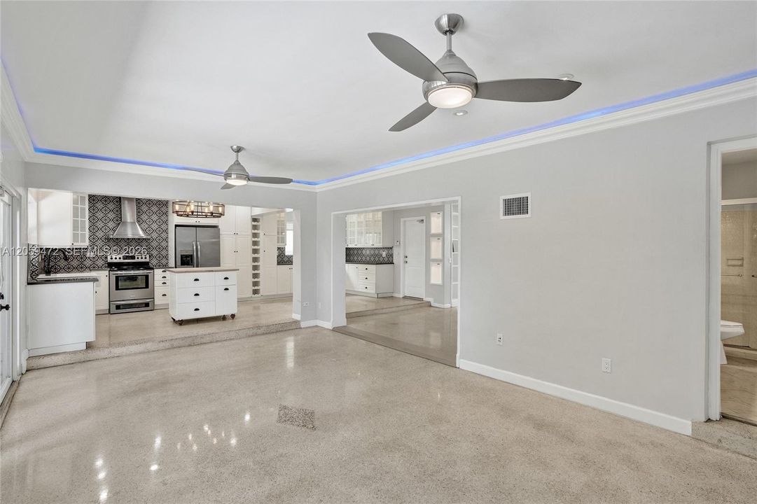 Vacant and freshly painted sparking white with accent gray tones.