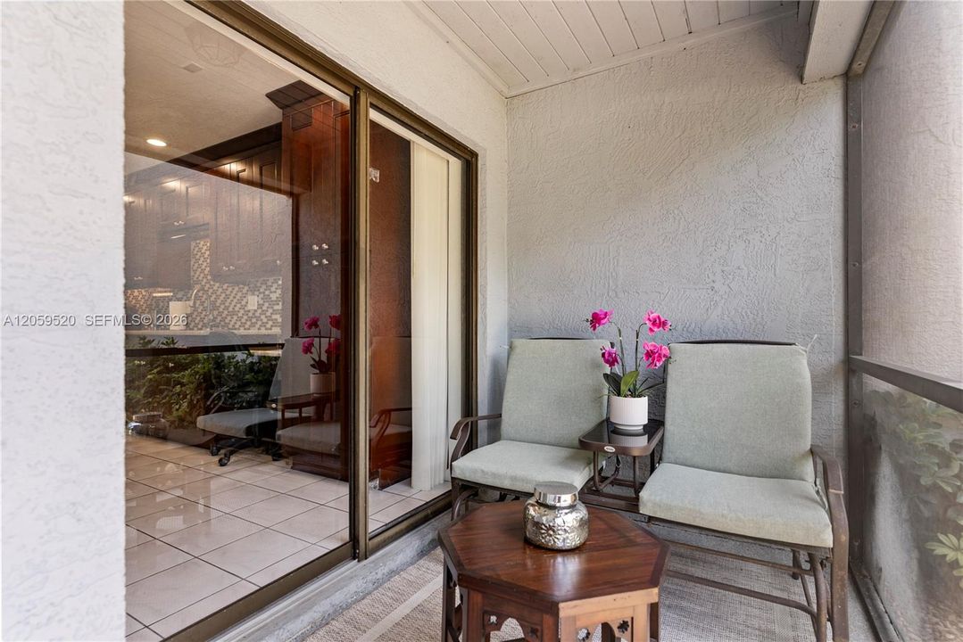 Screened-in patio off the kitchen to drink your morning coffee or unwind with a glass of wine and watch the sunset!