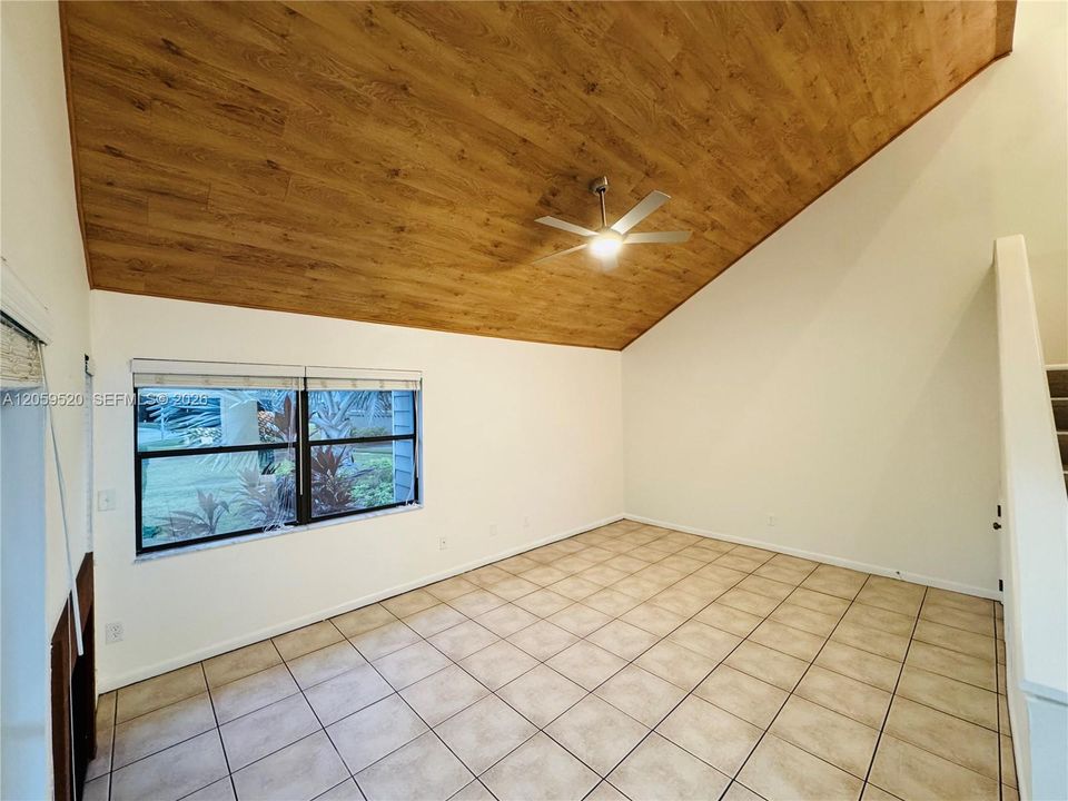 Living room features a working wood burning fireplace
