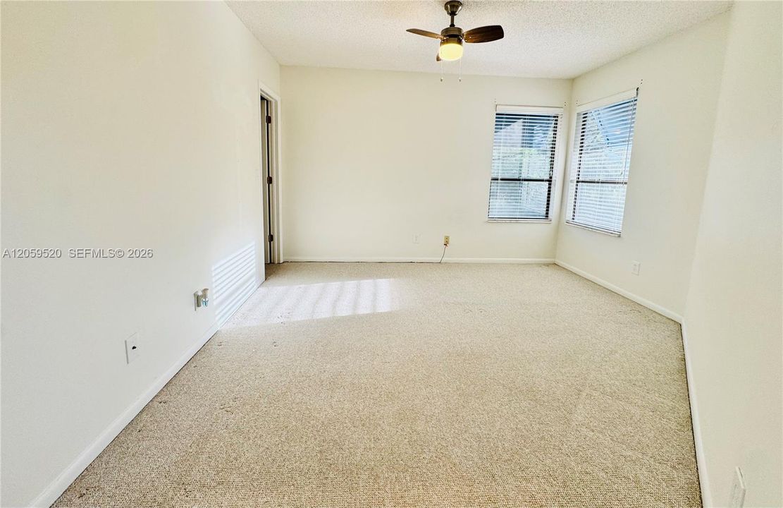 Second bedroom with a large walk in closet