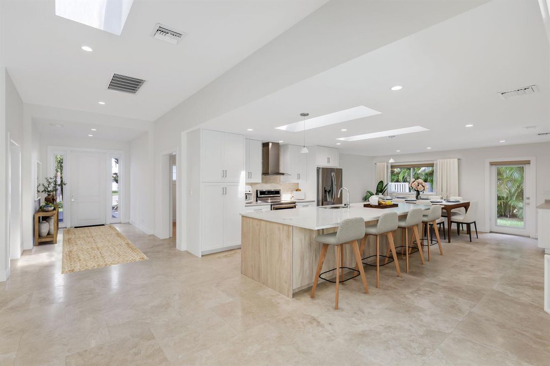 Foyer/Kitchen/Dining Virtually Staged