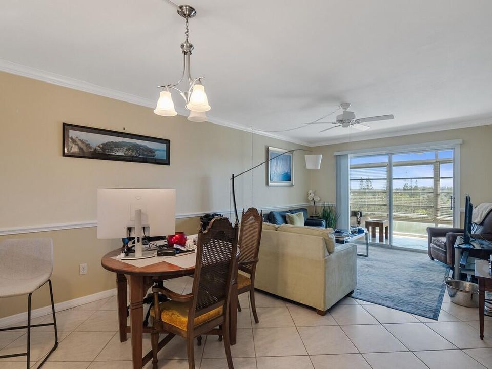 DINING AREA TO GREAT ROOM AND PORCH
