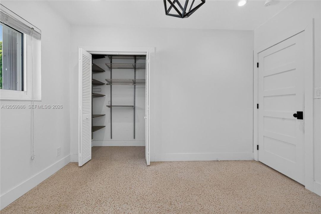 Spacious closet in one of the secondary bedrooms